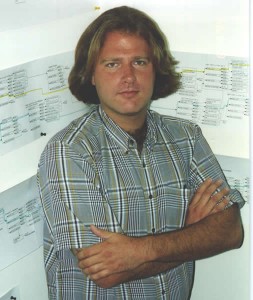 Chris Bankston, Executive Producer at TruVideo, in 1994, standing in front of the decision tree crafted for Surgical Strike.